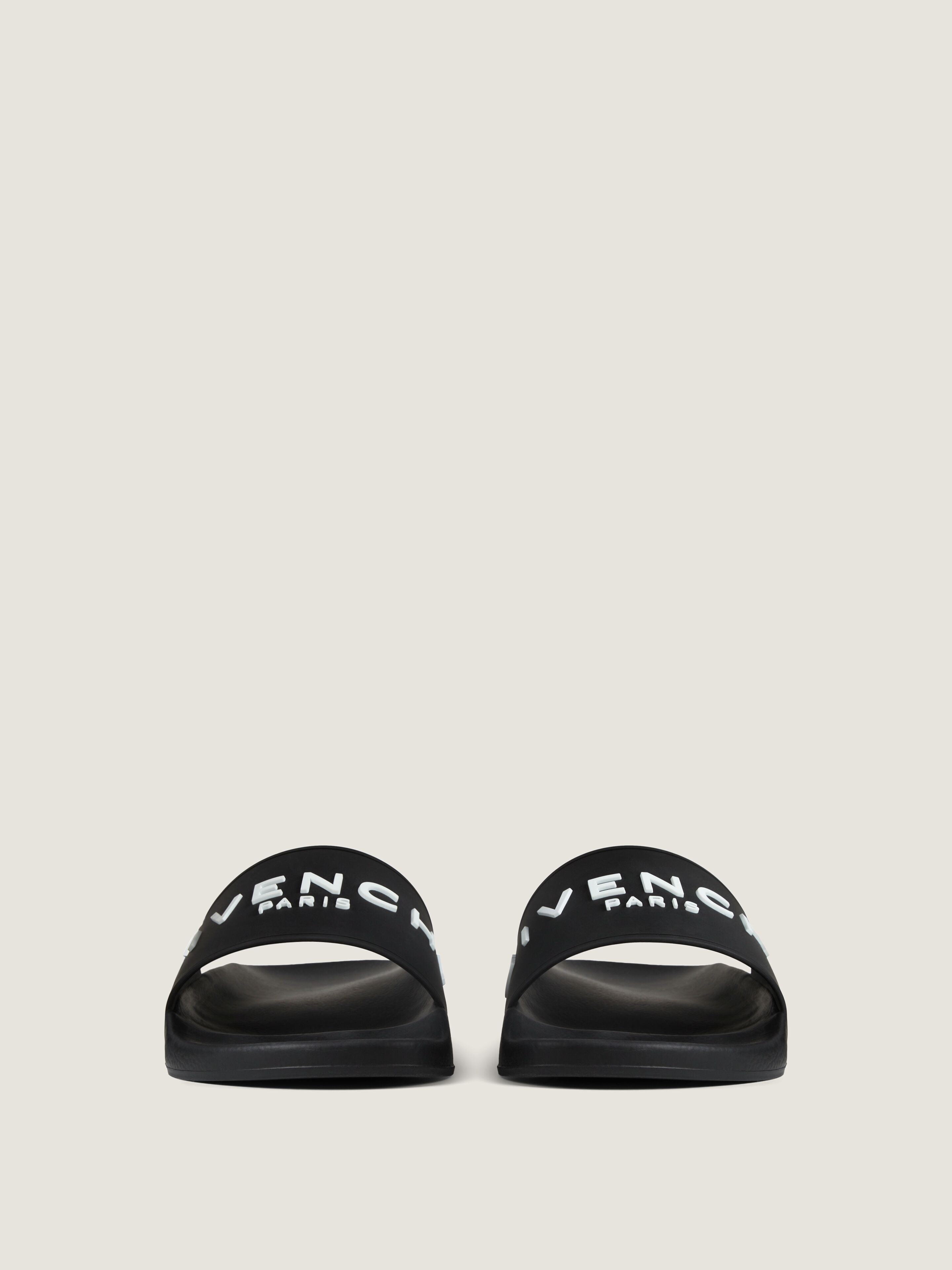 Slide flat sandals in rubber